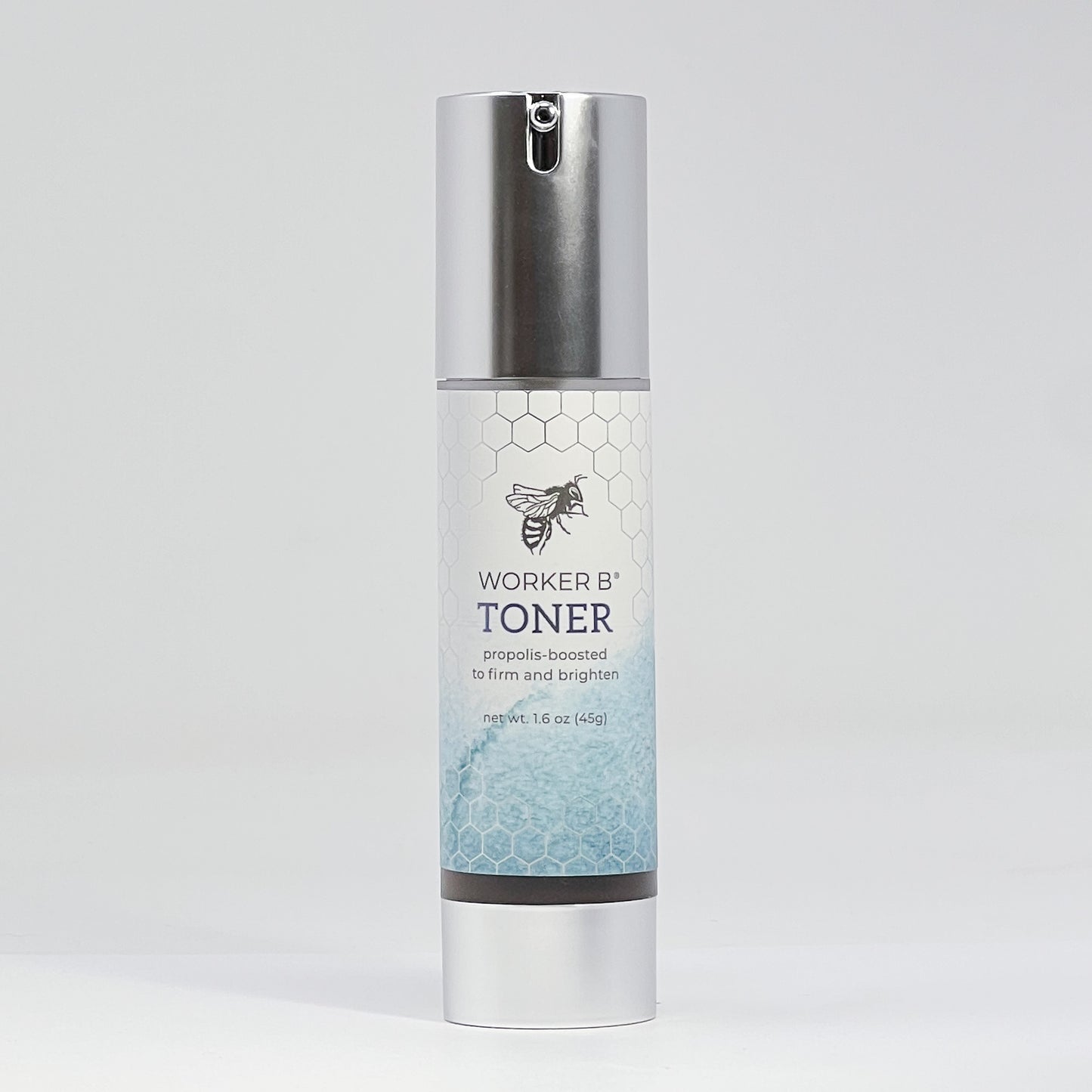 Worker B toner bottle with silver cap and honeycomb design on a light gray background