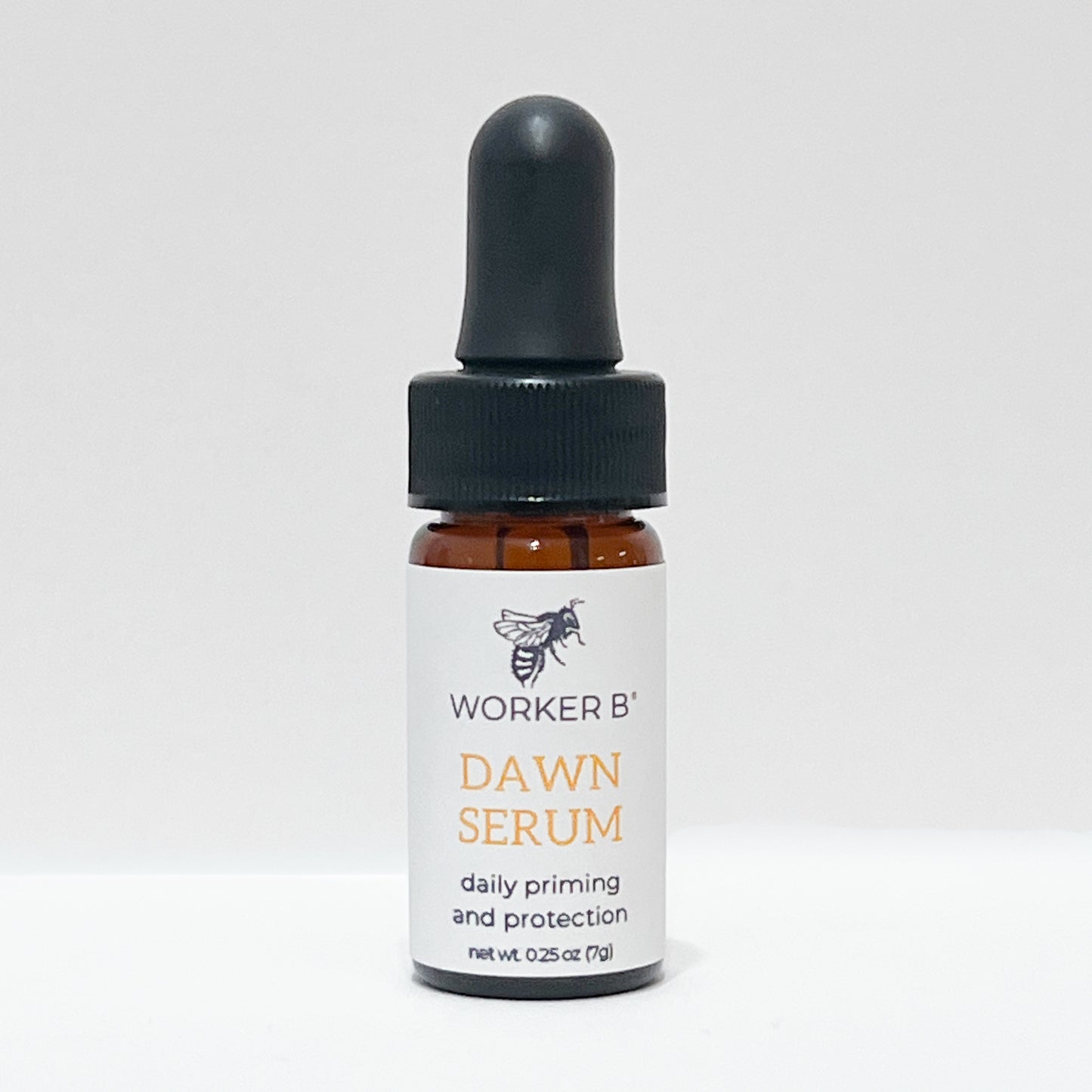 Bottle of Worker B' Dawn Serum on a white background