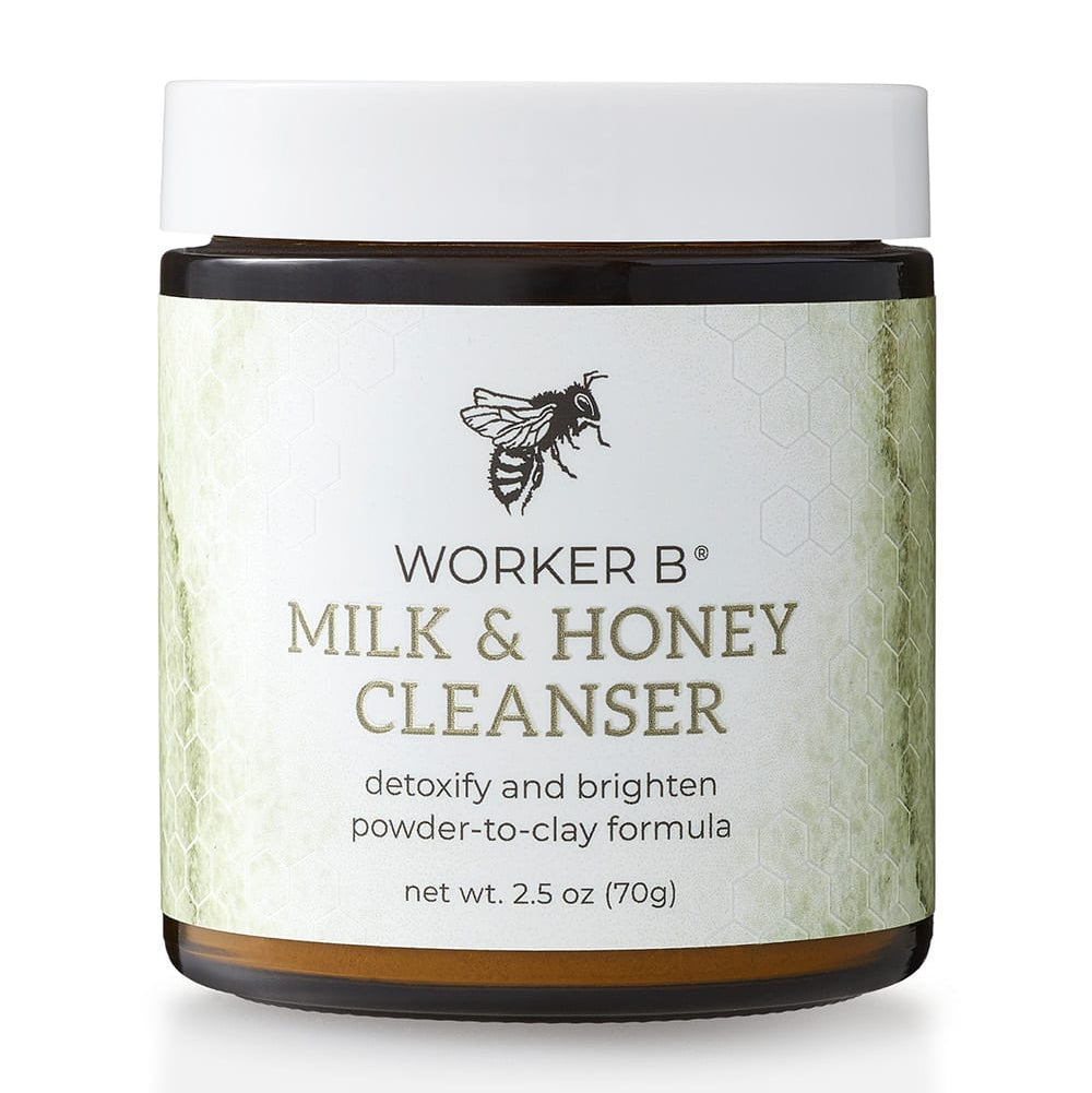 Jar of Worker B Milk & Honey Cleanser with a white label and black lid on a white background