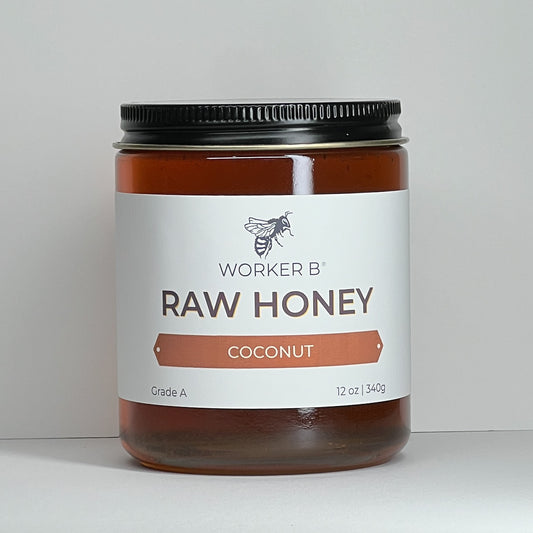Jar of Worker B Raw Honey Coconut on a white background