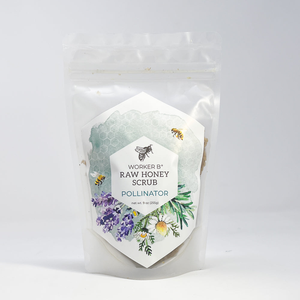 Raw honey scrub packaging with floral design and text on a white background
