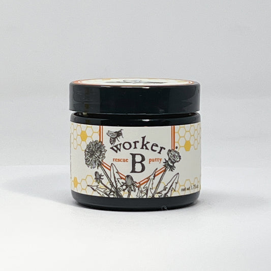 Jar of 'worker B' rescue putty with a black lid on a white background